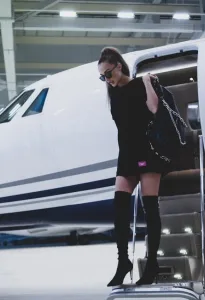 Woman getting down flight stairs