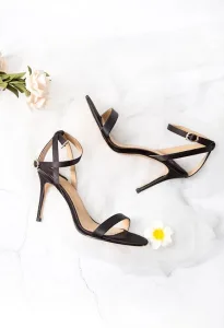 Black-footwear-in-flower-background