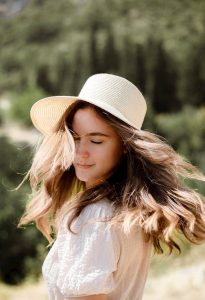 Girl in white dress and hat