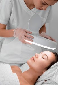 women getting white light therapy