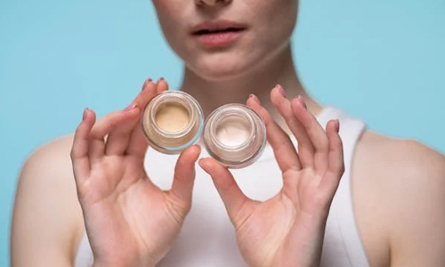 Women with empty bottles on hand