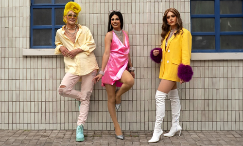 3-people-posing-in-colorful-dress