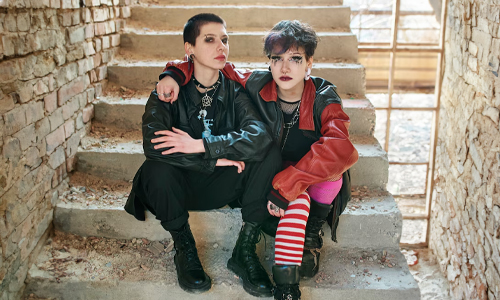 2-people-sitting-in-stairs