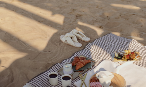 White sandals on beach