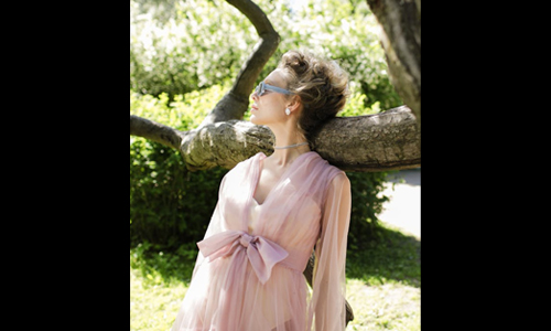 Women standing near tree