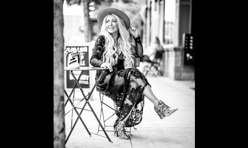 Women wearing sheer dress and hat