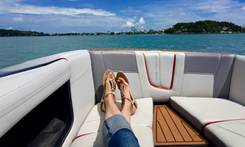 woman’s legs on a boat