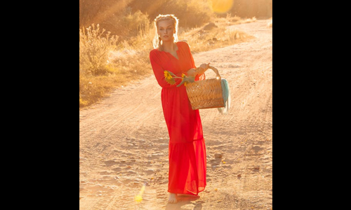 Woman wearing red maxi dress