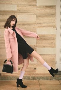 Women wearing pink long jacket