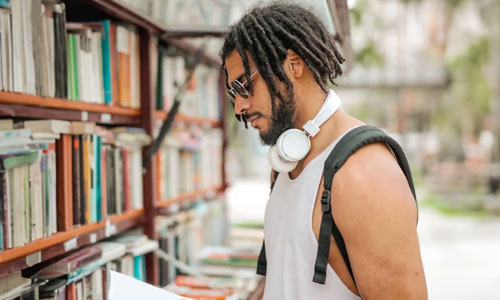 Man-wearing-white-hd-phones