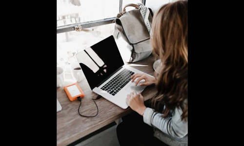 women working on laptop