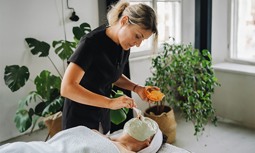 Women-applying-clay-mask