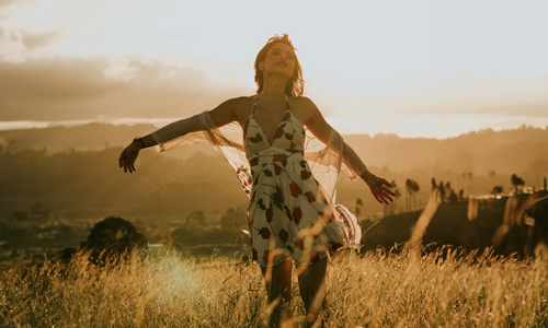Women-wearing-white-dress-with-red-flowers
