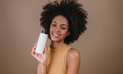 Woman with product in hand