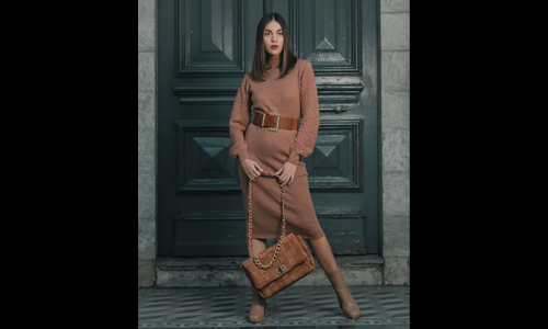 Woman in brown outfit