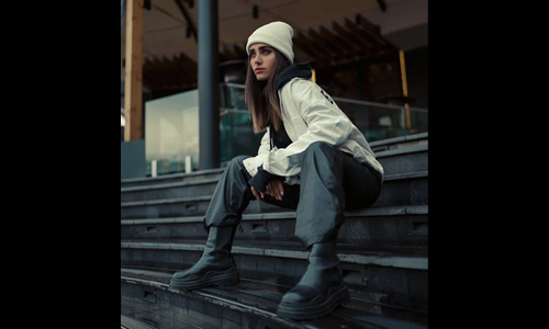 Woman wearing white jacket