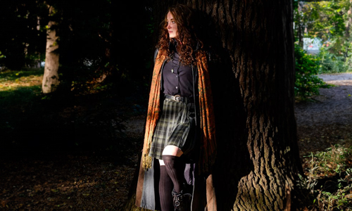 woman-wearing-cape-coat