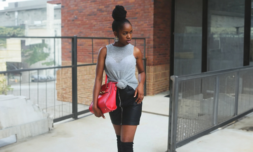 Woman-holding-red-bag