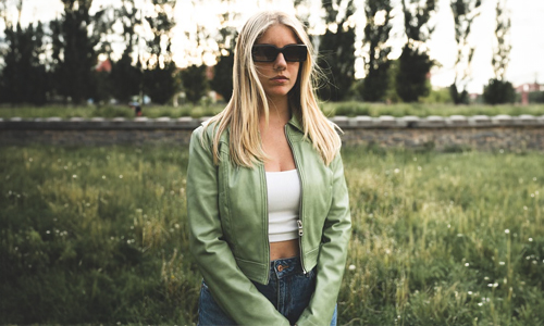 Woman-wearing-green-leather-jacket