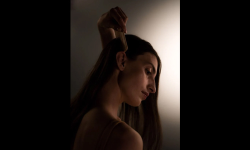 Women using wooden comb