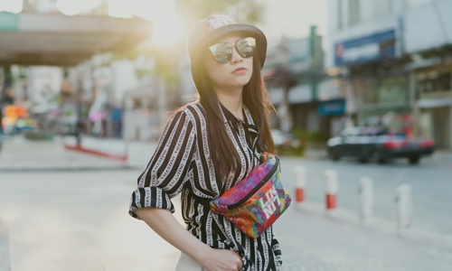 Woman-wearing-hat-and-coolers