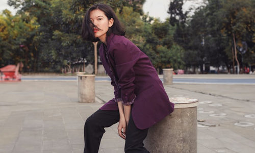 Woman-in-purple-blazer