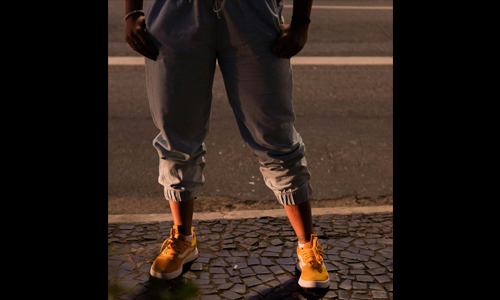 Woman wearing orange shoes