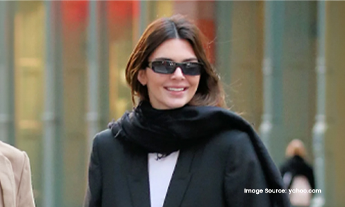 Kendall wearing black shades