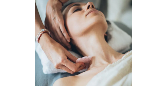 Woman-on-gua-sha-massage