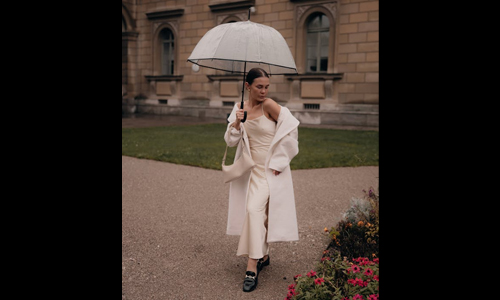 Woman in full white outfit