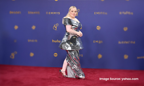  women in sequin metallic dress_