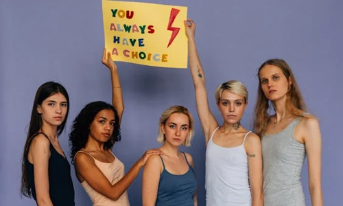 Women holding a board