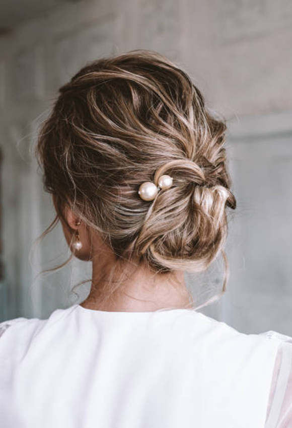 7 Quick Messy Bun Hairstyles to Try When You’re Running Late