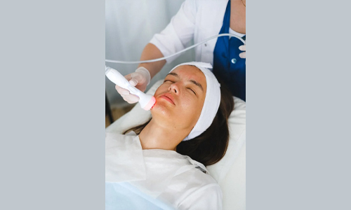 Woman getting professional facial