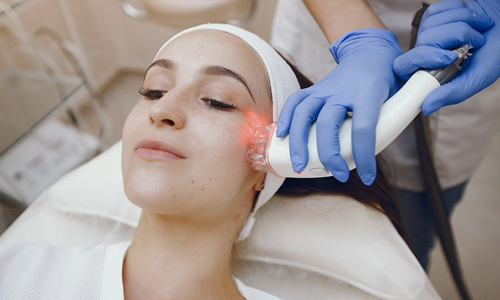 Women-using-LED-device