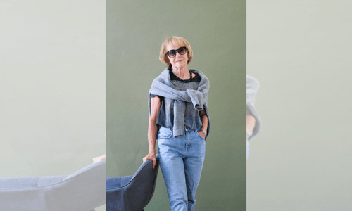 Stylish elder woman wearing sunglasses.