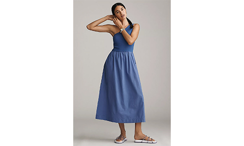 Woman wearing a modern twofer dress, styled for a contemporary look.