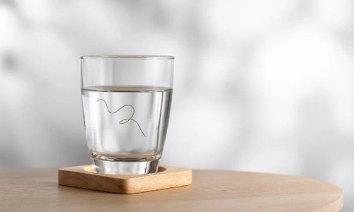 Place a clean strand of hair in a glass of water to test hair porosity at home