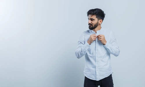 Young man posing in a stylish shirt with a structured collar