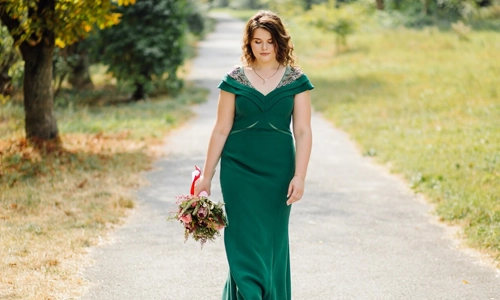 A beautiful bride wearing green wedding dress