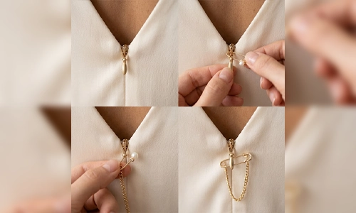 Safety pin attached to a dress zipper pull for easier reach