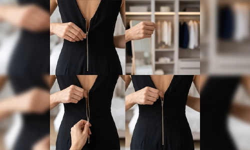 Close-up of a dress zipper caught in the fabric lining 