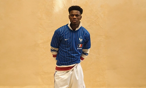 Vintage football shirt displayed as a collectible fashion piece.