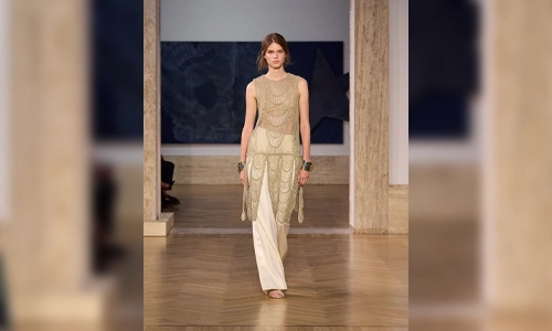 a model wearing Fendi Fall winter collection in Rome inspired by structured silver jewelry