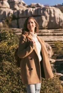 Gen Z woman wearing a classic boucle jacket