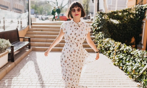 Modern calico dress styled with minimalist accessories