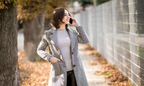 woman wearing a boucle jacket