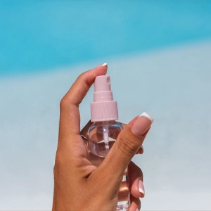 use sunscreen mist for a makeup-friendly refresh