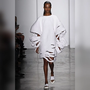 destructive clothing that intentionally incorporates signs of damage, deconstruction or unfinished construction