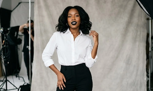 woman wearing a white shirt and black lipstick